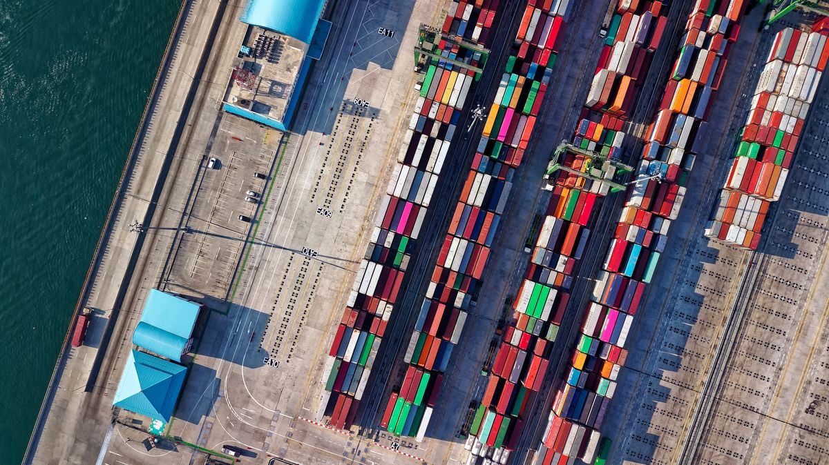 Shipping containers stacked at a port